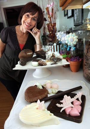 Double Dipped owner Linda Rosenburg of Framingham displays some of her kosher chocolate creations.