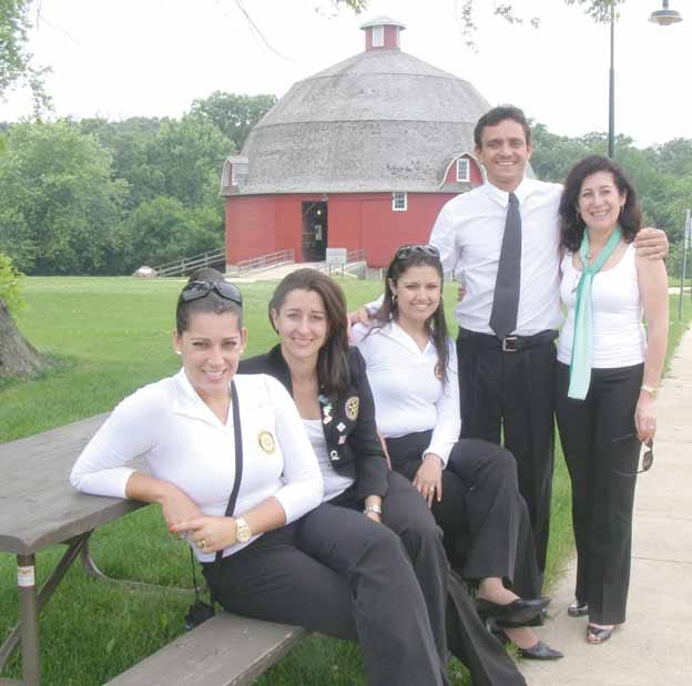 From Brazil to Ryan’s Round Barn, a Rotary International Group Study Exchange team arrived in Kewanee Tuesday for a three-day visit. They include, from left, Daniele Cristina Rodrigues Maciel, Tatiana Rocha Antunes, Fernanda Resende de Oliveira Sousa, Marcelo de Lima Coutinho and Geralda Maria Maia Cordeiro de Azevedo, team leader. Tuesday afternoon they visited Francis Park and the Round Barn at Johnson Sauk Trail State Park.