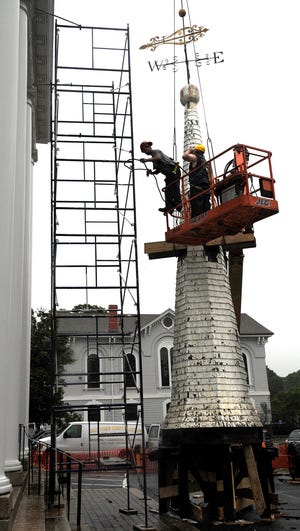 Old Time Restoration brought the First Congregational Church steeple (dating back to 1822) to the ground Friday morning. Plans are underway to rebuild or repair it.