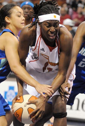 Connecticut Sun's Kerri Gardin gets double teamed by New York Liberty's Leilani Mitchell, left, and Shameka Christon, right, during the first quarter in the WNBA pre-season opener at Mohegan Sun Arena in Uncasville, Conn., Friday, May 22, 2009. (AP Photo/The Day,Tim Cook) ** MAGS OUT. NO SALES. MANDATORY CREDIT. **