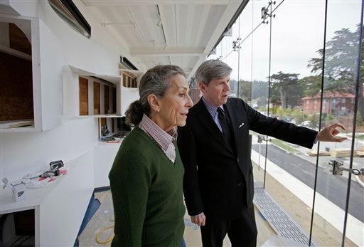 Diane Disney Miller, left, daughter of Walt Disney, and founding executive director Richard Benefield, right, look over the surrounding view of the Presidio from a walkway in a gallery under construction at the Walt Disney Family Museum in San Francisco, Friday, June 12, 2009. With an opening date of Oct. 1, 2009, the museum will feature 10 galleries, starting with Disney's beginnings on a Missouri farm and tracing the ups and downs of his career