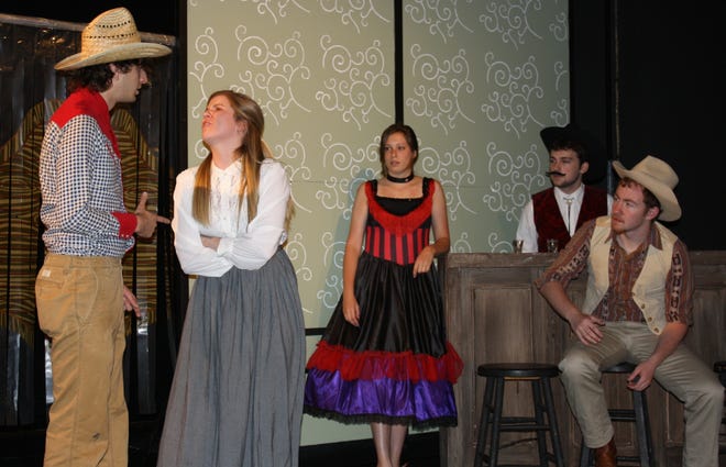 In "Out West.” Girl (Kelly Whelan) tells Brother (Nick Chris) that she is not “sweet on someone while Betsy (Elizabeth Kennedy), 
Barkeep (Michael Norton) and Cowboy (Christopher O'Reilly) look on.