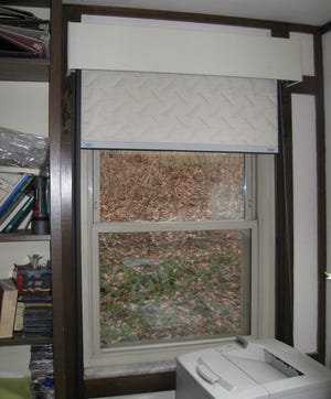 An insulating window shade with sealed sides blocks all three modes of heat loss and improves your comfort when sitting near a window.