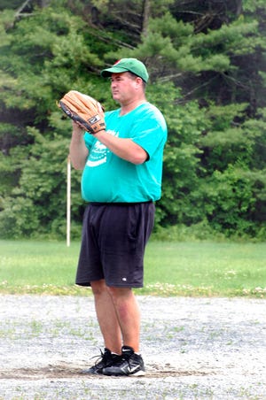 Chris Ganley gets ready to deliver a pitch during Plympton’s Old Home Day softball game.