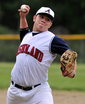 Ashland Legion's Cato LaCroix delivers a pitch against North Chelmsford Friday in Ashland.