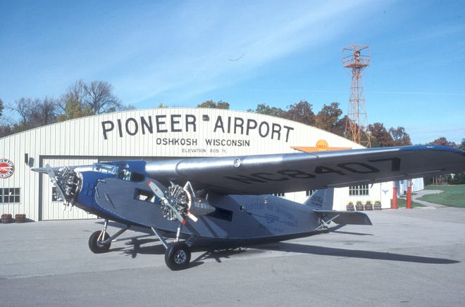 The Experimental Aircraft Association’s 1929 Ford Tri-Motor is pictured in front of its hangar in Oshkosh, Wis.