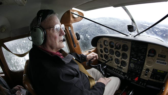 Ray Arnold pilots the Cessna 185 airplane he uses to deliver mail and other supplies to the remote Idaho backcountry, over central Idaho's Frank Church-River of No Return Wilderness. Arnold flies the only backcountry air mail route left in the lower 48 states, delivering mail to nearly two dozen ranches on a stretch of land larger than Indiana.
