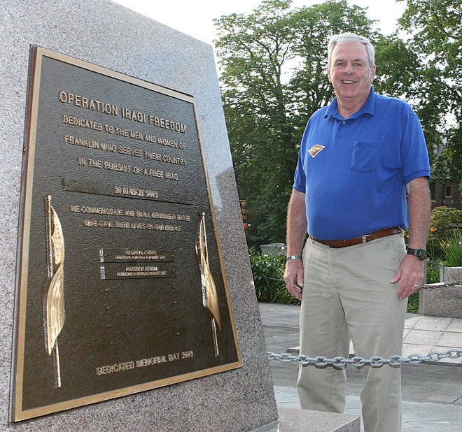 Franklin resident Joseph Collins, a veteran of the wars in Vietnam and Iraq, stands at the new memorial to Iraq veterans on the Franklin Town Common yesterday. Speaking of his days in the service, Collins said, "It will always be an honor that I served."