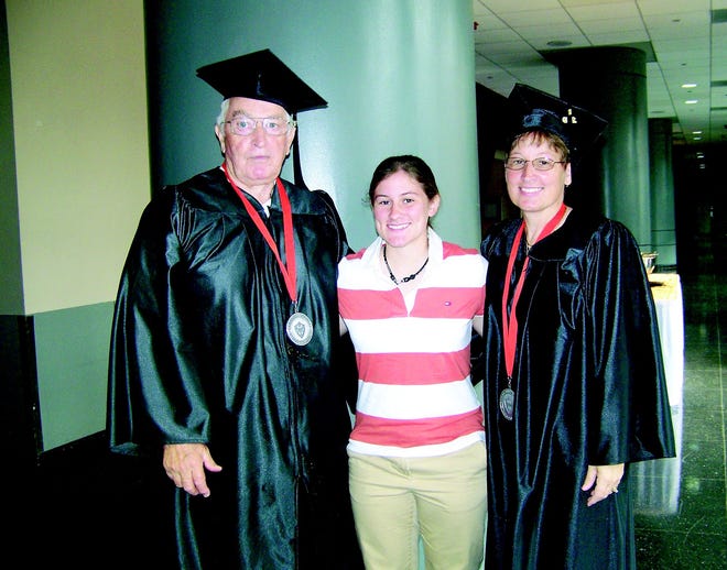 Empire State College graduates Arthur Reynolds and his daughter, Patricia Wagar, pose with Wagar's daughter, Stephanie Wagar. Stephanie was also a fellow graduate this year from Monroe Community College with an associate's in physical education.