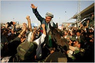 The forces of Gen. Abdul Rashid Dostum, shown on horseback at a campaign rally, were said to have killed Taliban prisoners.