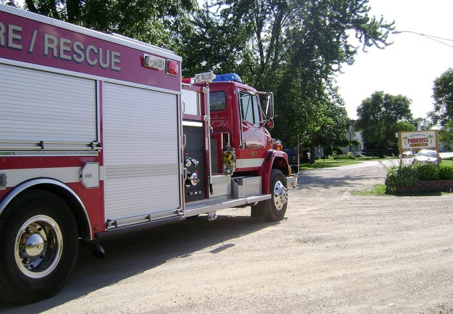 A Boone County Fire District 2 truck sits outside Paradise RV Park at the scene of a water rescue attempt in Garden Prairie on Saturday, July 11, 2009.
