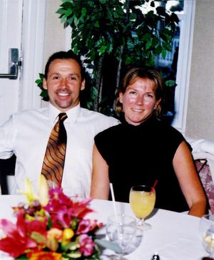 Brian J. Cherry of Abington, with his wife, Donna, in a 2003 photo. Cherry died Sunday.