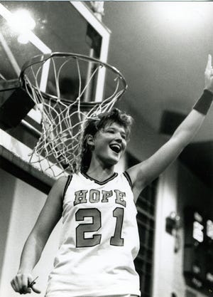Contributed/Hope College
Dina Disney Hackert celebrates after the Hope College women's basketball team won the 1990 NCAA Division III national championship at Holland Civic Center.