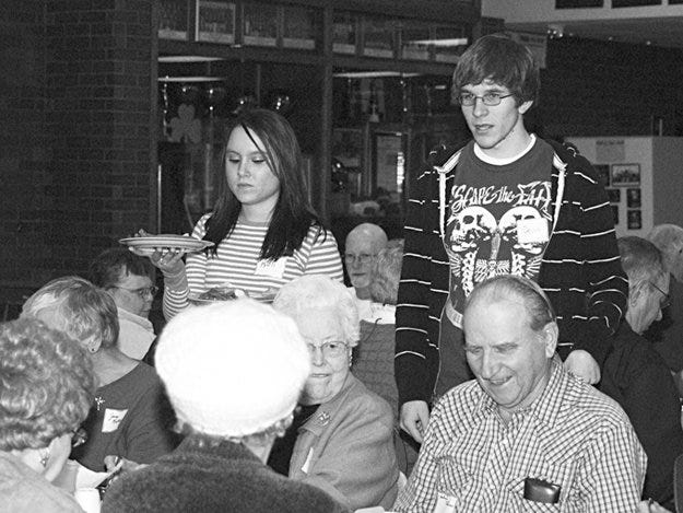 Orion High School seniors in CECO (Cooperative Education Club of Orion) hosted senior citizens from the Orion school district at a dinner in their honor on Wednesday, March 11. Among the servers were Karli Morse and Devin Pettifer.