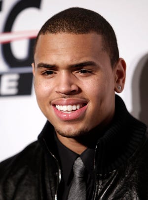 In this Feb. 7, 2009 file photo, Chris Brown arrives at the Clive Davis pre-Grammy party in Beverly Hills, Calif.