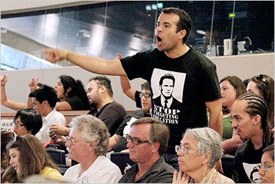 Protesters opposing higher fees attended a meeting of California State University trustees Tuesday in Long Beach.
