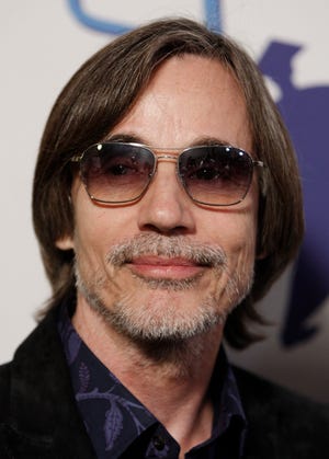 In this Oct. 21, 2008 file photo, Jackson Browne arrives at the The Dream Believe Achieve Inspiration Gala in Los Angeles.