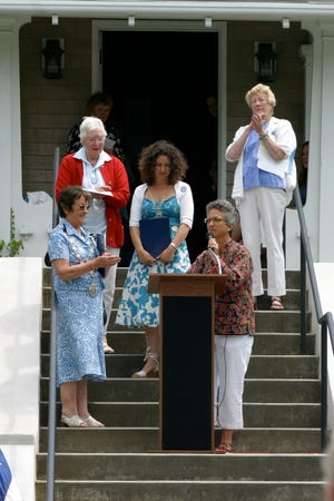 State Rep. Sarah Peake presents Mayor Rosamund Cox of Truro, England (left), with a citation from the state of Massachusetts. Cox’s daughter, Mayoress Becky Dawes (middle), Truro, England councilor Connie Fozzard (left back), and Jane Peters (right), Truro’s tercentennial chair, look on.