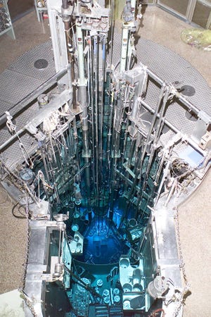 Water in the University of Missouri Research Reactor core has a blue hue in this 2000 image. The core will be used to create molybdenum-99, parent isotope of technetium-99, a key medical isotope in short supply. MU is making preparations to produce the isotope.