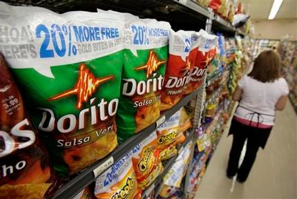 Doritos chips are seen on display at a market in Palo Alto, Calif., Tuesday, July 21, 2009. Tough times also mean consumers have less money to spend, so they want those bigger packages. Experts say this is a promotional tool that helps branded food companies steer shoppers back to their products and away from less expensive, store-brand alternatives.