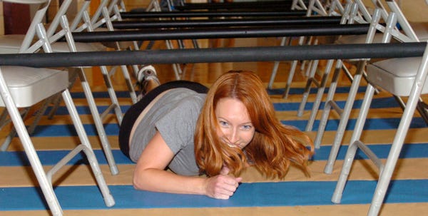 Melanie VanDerveer goes through an obstacle course at the Pocono YMCA.