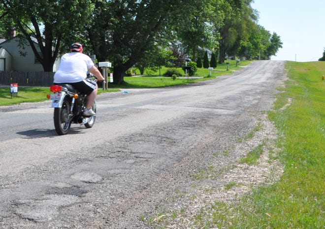 About seven miles of road, including this stretch of Old Harlem Road in Machesney Park, are set for resurfacing this summer.
