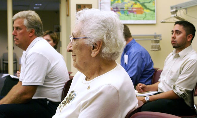 Longtime resident Millie Priem is one of the seven new members on the Belvidere Historic Preservation Commission. She and other commissioners listened to Mayor Fred Brereton talk about the importance of the commission Tuesday, July 28, 2009.