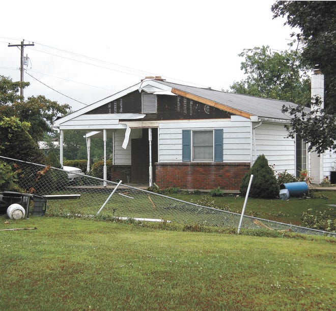 The house of Denny and Glenda Sipes in Lemasters was hit especially hard by Wednesday night’s storm.