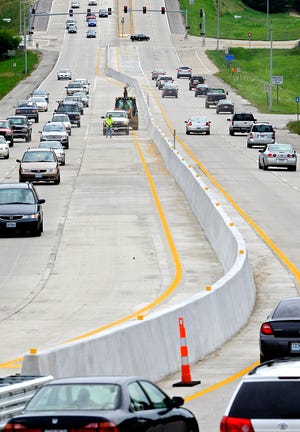 A new concrete barrier divides the northbound and southbound lanes of Providence Road south of Stadium Boulevard. The barrier is meant to restrict turns and cause more pedestrians to cross at signals during University of Missouri sporting events, said Matt Myers, a traffic engineer for the Missouri Department of Transportation.