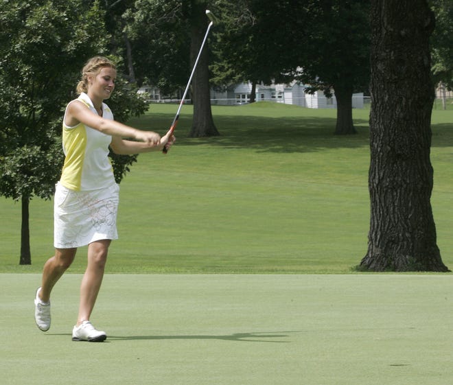 Jordan Hatch celebrates after her final putt on the 18th hole goes in, making her the 2008 Rockford Women's Golf Classic champion.