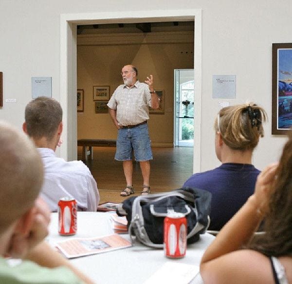 Artist David Lewis, known for his sculptures, speaks to a group from Barnstable Action for New Directions.