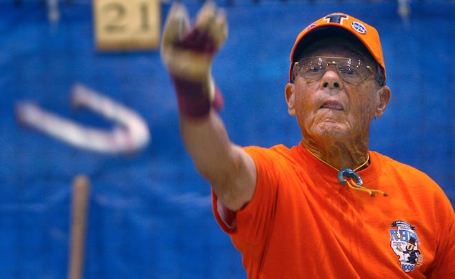 At 92, Don Boyer is the oldest competitor in the 100th annual World Horseshoe Pitching Championship at the Prairie Capital Convention Center. Boyer, of Martinsville, pitches a horseshoe during competition against Skip Logan on Tuesday August 4, 2009.