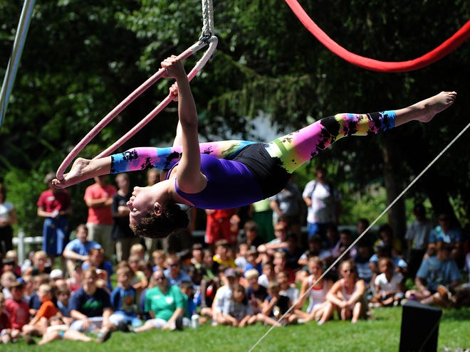 C.I.T. Sarah Garson, 16, of Newton shows off her lyra skills which she has been studying on the side.
For the fourth straight year, the MetroWest YMCA Hopkinton Summer Day Camp has partnered with Simply Circus to provide a unique two-week specialty camp to learn circus performance skills. Friday offered the kids, ages 8-14, the chance to show what they've learned by putting on their own circus.
