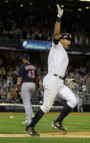 New York Yankees' Alex Rodriguez reacts after hitting a game winning two-run home run during the 15th inning of a baseball game as Boston Red Sox's Victor Martinez leaves the field Saturday in New York. The Yankees won the game 2-0.