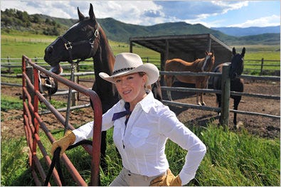 Susan Redstone with Jesse, a black thoroughbred mare, at a ranch in Old Snowmass, near Aspen, Colo.