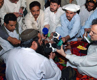 Baitullah Mehsud seen speaking with the news media in Pakistan in this photo taken May 24, 2008.