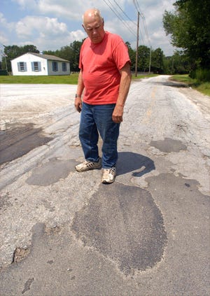 Walter Wahl Sr. 73, of Lily Pond Road in Griswold would like the recently patched road replaced.
