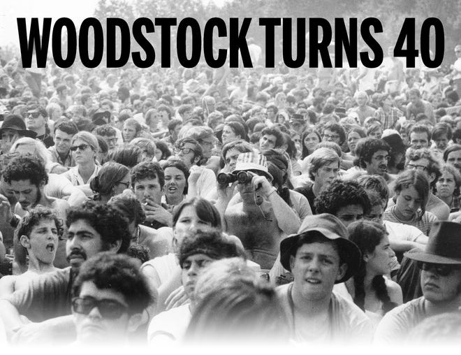 This 1969 file photo shows the crowd at the Woodstock Music and Arts Festival held on a 600-acre pasture in the Catskill Mountains near White Lake in Bethel, N.Y..