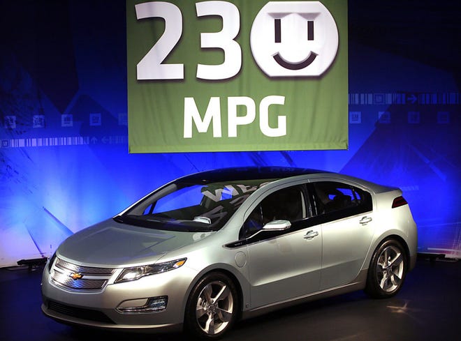 The Chevy Volt's 230 composite MPG rating was announced at GM's Tech Center in Warren, Mich. during a news conference Tuesday, Aug. 11, 2009. (AP Photo/Gary Malerba)