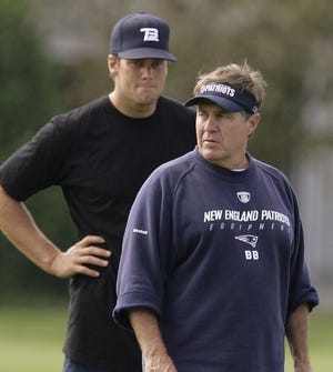 Patriots coach Bill Belichick (front) would not reveal how much he plans to play quarterback Tom Brady (rear) in the team's preseason opener against the Eagles.