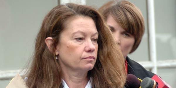 Daryl Reinhardt leaves District Justice Thomas Shiffer's office in February 2009 following her arraignment on charges stemming from the death of pedestrian Darrin Brown on Route 611 in Stroud Township in October 2008.