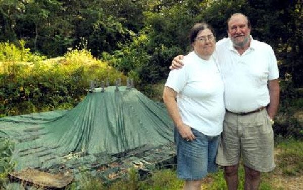 Francis and Wendie Howland of Bourne built the foundation for their proposed residential wind turbine but the town planning board rejected the project on grounds including its 132-foot height.