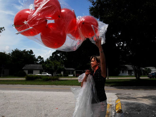 ANDY JACOBSOHN/The Times-UnionEach attached with Amber Alert information, balloons were released Monday to mark the sixth birthday of Haleigh Cummings, who has been missing since February.