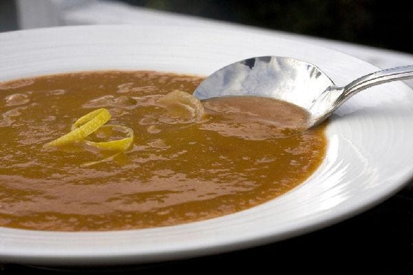 Inspired by soups used to break fast during the monthlong Muslim observence of Ramadan, this Lentil Soup with Lemon Zest is made with canned, not dry, lentils, making dinner much quicker.