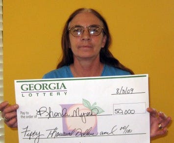 Courtesy of the Georgia LotteryRhonda Myers, an Ellabell school cafeteria worker won a $50,000 top prize playing Jumbo Bucks Classic. She purchased her ticket at the Zip-N-Foods 3279 Ga. 204 in Ellabell.\u201CI was thinking that maybe I\u2019d get lucky,\u201D she recalled. \u201CI was sitting down when I scratched it, and I almost fell on the floor when I saw that I\u2019d won.\u201DMyers and her husband Bobby have three adult children. eight grandchildren and one great-grandchild. She hopes to pay off all of her bills with the prize.\u201CI thought it was a dream,\u201D she shared. \u201CI\u2019m still dazed about it.\u201D
