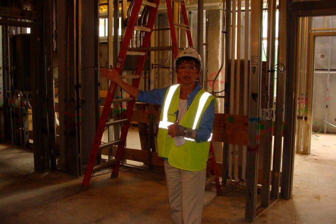 Project manager Janet Czech explains some points about the new emergency department being constructed as part of the Milestone Project at OSF Saint Francis Medical Center.