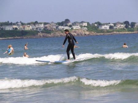 Surfers, many of them beginners, test out the waters recently at Long Sands Beach in York, Maine. 
Rachel M. Collins photo
