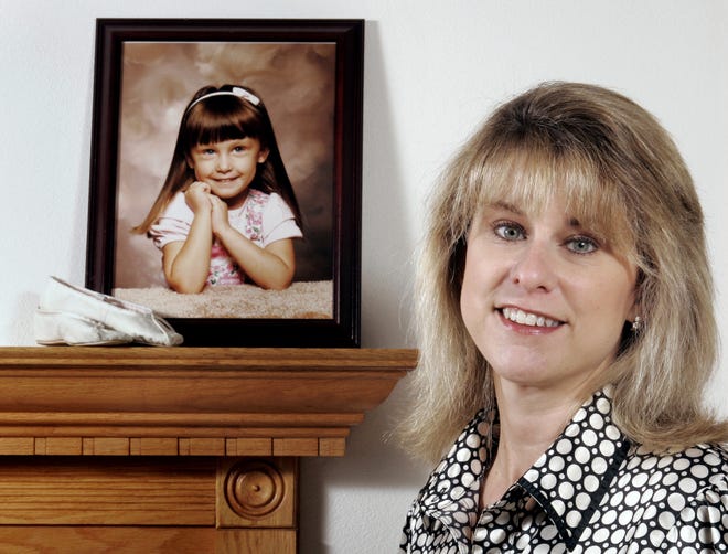 Linda Hedlund finds solace in the belief that she will some day be reunited with her daughter, Carol Ann, who died in 1992.