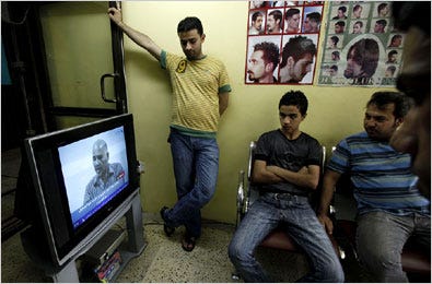 On Sunday, Iraqis in a Baghdad barbershop watched a man confessing to an attack last week.