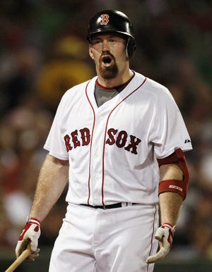 Boston's Kevin Youkilis shouts after striking out in the second inning.